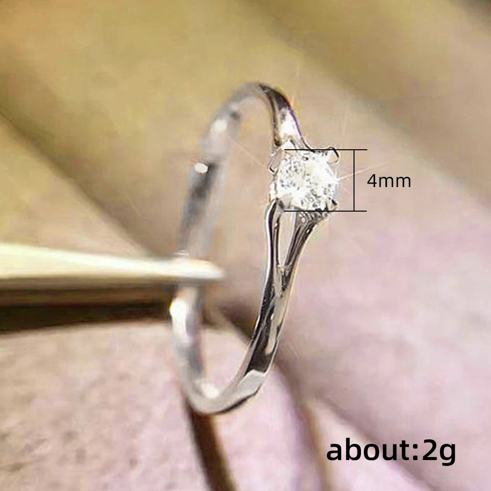 Huitan Minimalist Women's Wedding Rings with 4MM Cubic Zirconia Simple Elegant Female Finger Accessory Engagement Bands Jewelry