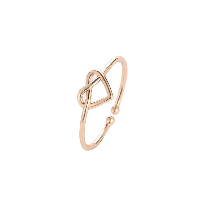 Korean version simple hollowed out heart-shaped opening adjustable ring with infinite love, peach heart tail ring, hand jewelry